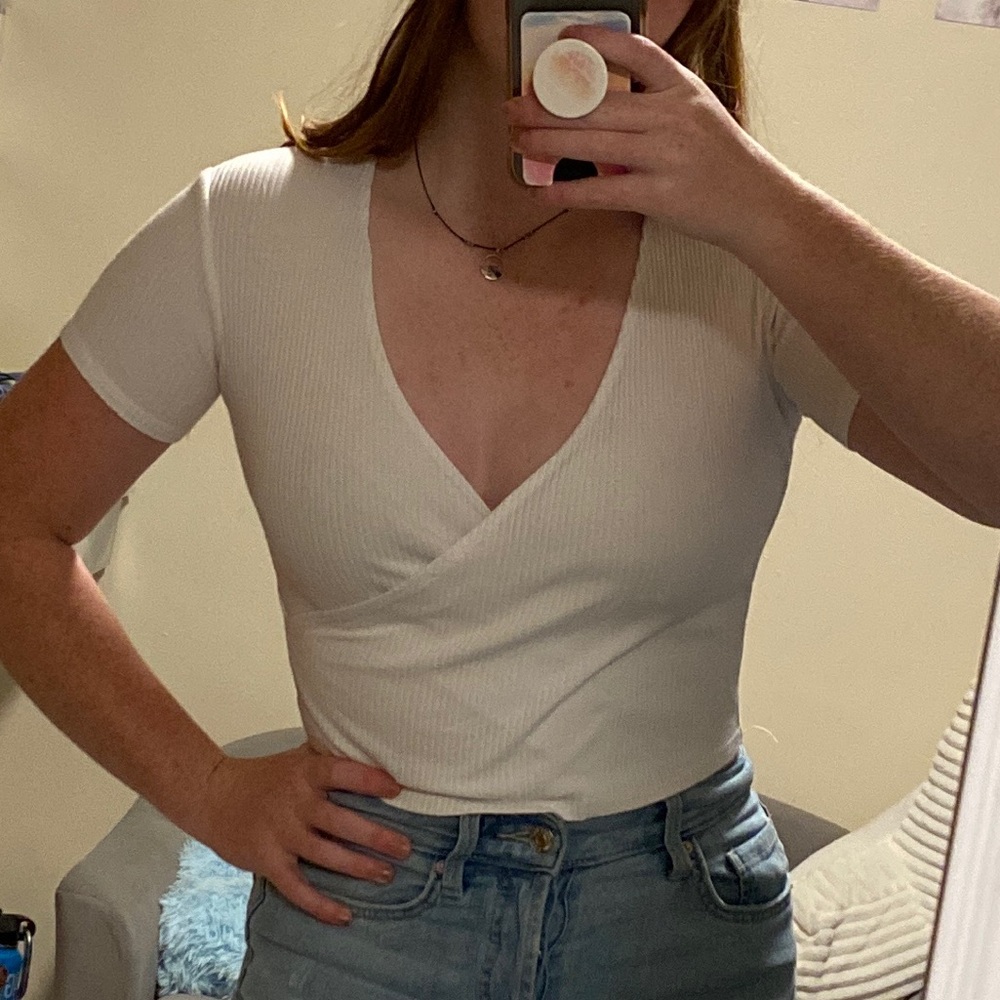 Whit going out top